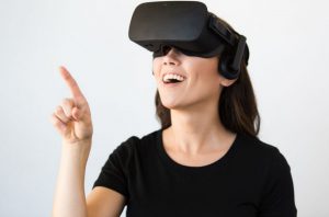 Image of a woman wearing virtual reality goggles