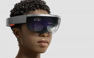 Photo of a woman wearing the HoloLens Headgear