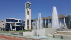 Photo of the fountain and exterior of Duane G. Meyer Library