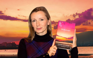 Photo of Anna Burns with her book, Milkman