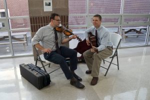 David Scrivner plays the fiddle