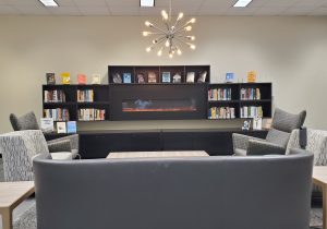The faux fireplace in the Living Room area of Duane G. Meyer Library
