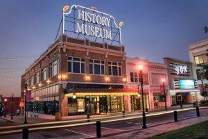 Exterior photo of the History Museum on the Square at dusk