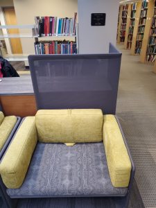 photo of chair and oversized books