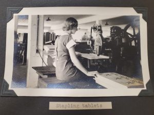 Young woman making tablets