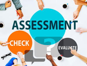 TEXT: Assessment, Check, ?, Evaluate. Multiple sets of hands are shown, signaling involvement of different group members. 