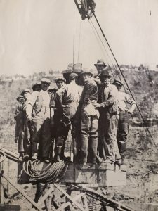 Group of workers building Powersite Dam