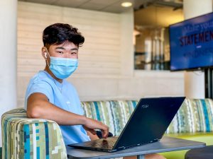 an MSU student in the Library Lobby