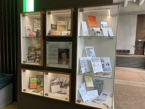 A display case inside Coger Theatre with a display of items celebrating Tent Theatre's history and honoring the 60th anniversary season.