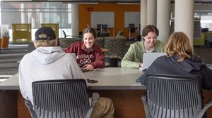students studying in the main lobby