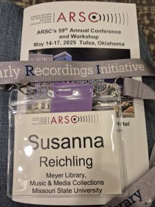 Nametag of Susanna Reichling and program for conference.