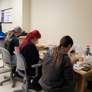 Art students doing conservation work